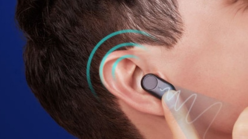 man-wearing-bluetooth-device